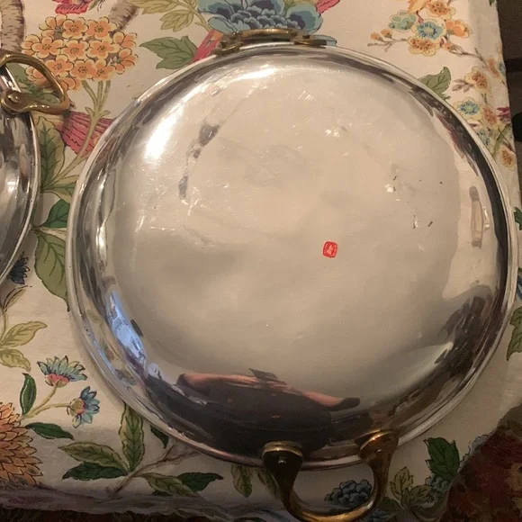 Stainless steel? Brass handle huge trays? Skillets? Made in Mexico